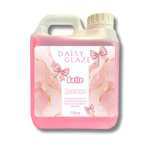 Pink bottle of Daisy Glaze Belle Acetone with a decorative label on a white background